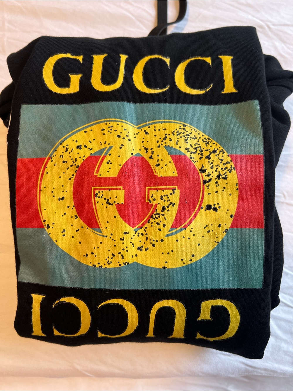 Gucci Mens Black Logo Graphic Sweater with Yellow Emblem